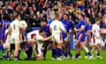 France celebrate at the final whistle of their 25-13 win in Paris, as England pick themselves up off the turf