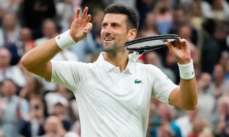 Novak Djokovic mimics playing a violin after defeating Alexei Popyrin.