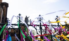 Ribbons tied to a fence outside a church