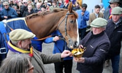 Colin Tizzard with Native River and the Cheltenham Gold Cup trophy