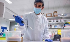 Rishi Sunak in a hospital lab in mask