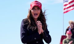 woman in a red baseball cap outside