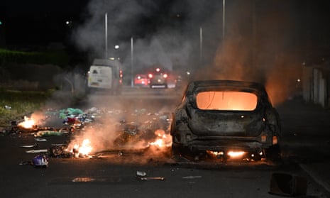 Rioters clash with police in 'large-scale disorder' in Cardiff – video report