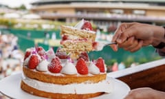 Victoria sponge decorated with strawberries and edible flowers photographed with a view of No.1 Court at The Championships 2024. Held at The All England Lawn Tennis Club, Wimbledon. Day 4 Thursday 04/07/2024. Credit: AELTC/Andrew Parsons.