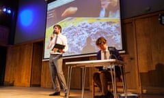 Jason Ward does a puzzle on stage while organiser James Ward bores the audience.