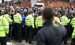 Birmingham City v Aston Villa - Sky Bet Championship - St Andrew’s Trillion Trophy Stadium<br>Police surround fans ahead of the match during the Sky Bet Championship match at St Andrew’s Trillion Trophy Stadium, Birmingham. PRESS ASSOCIATION Photo. Picture date: Sunday March 10, 2019. See PA story SOCCER Birmingham. Photo credit should read: Nick Potts/PA Wire. RESTRICTIONS: EDITORIAL USE ONLY No use with unauthorised audio, video, data, fixture lists, club/league logos or “live” services. Online in-match use limited to 120 images, no video emulation. No use in betting, games or single club/league/player publications.