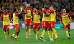 Ligue 1 - RC Lens v RC Strasbourg<br>Soccer Football - Ligue 1 - RC Lens v RC Strasbourg - Stade de la Meinau, Lens, France - April 7, 2023 RC Lens' Przemyslaw Frankowski celebrates scoring their first goal with teammates REUTERS/Pascal Rossignol