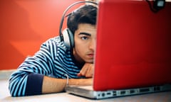 Young Man Listening to Music on Headphones