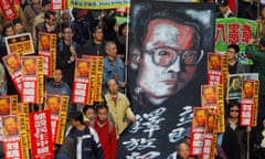 Liu Xiaobo wins Nobel Peace Prize for 2010<br>epa02382862 (FILE) A file picture dated 01 January 2010 shows pro-democracy lawmakers and demonstrators carrying banners during a rally in Hong Kong, China 01 January 2010. Thousands of people stage a protest demanding the election of the chief executive in 2017 and all legislators on a 'one person, one vote' basis in 2020 and urging China's government to release Chinese dissident Liu Xiaobo. Dissident Chinese writer and human rights activist Liu Xiaobo wins Nobel Peace Prize for 2010, it was announced in Oslo, Norway 08 October 2010.  EPA/YM YIK  EPA EPA *** Local Caption *** 00000401977874