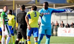 Haringey Borough v Yeovil Town, London, UK - 19 Oct 2019.<br>Valery Pajetat of Haringey Borough points in the direction of a minority of Yeovil Town supporters following an alleged racist incident directed toward the Haringey Borough goal-keeper during the Emirates FA Cup match between Haringey Borough and Yeovil Town at Coles Park Stadium, Tottenham, London on the 19th October 2019 | Photo: James Fearn/PPAUK.