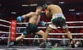 Canelo Álvarez throws a shot at Jaime Munguía during Saturday’s fight.