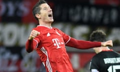 Robert Lewandowski celebrates after scoring for Bayern Munich v Bayer Leverkusen