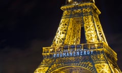 The front of the Eiffel Tower bears the message 'Human Energy' as part of a light installation entitled 'Human Energy' by artist Yann Toma drawing attention to human-generated power, on the sidelines of the COP21 Climate Conference, in Paris, France, 06 December 2015. EPA/IAN LANGSDON
