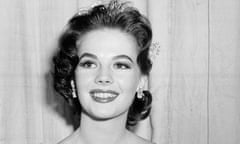 FILE - Actress Natalie Wood appears at the Academy Awards in Los Angeles on March 27, 1957. In a memoir coming out next week, "Little Sister: My Investigation into the Mysterious Death of Natalie Wood," Wood's younger sister Lana Wood alleges that her sister was sexually assaulted by Kirk Douglas. She claims the incident happened in the summer of 1955, around the time Natalie Wood was filming “The Searchers.” (AP Photo, File)