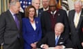 US-POLITICS-CONGRESS-PELOSI-VIRUS<br>An April 5, 2022 photo shows US President Joe Biden signing H.R. 3076, the ÒPostal Service Reform Act of 2022Ó, during a ceremony in the State Dining Room of the White House in Washington, DC. From left: Senate Majority Leader Chuck Schumer, D-NY; House Speaker Nancy Pelosi, D-CA; Senator Rob Portman, R-OH; Senator Thom Tillis, R-NC; and House Majority Whip Jim Clyburn, D-SC, and Senate Majority Leader Steny Hoyer, D-MD. - Nancy Pelosi, the Democratic speaker of the US House of Representatives, has tested positive for Covid-19, her spokesman said April 7, 2022. (Photo by MANDEL NGAN / AFP) (Photo by MANDEL NGAN/AFP via Getty Images)