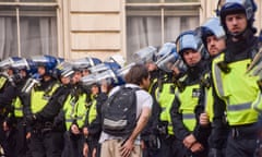 Protesters clash with police in Westminster following the knife attacks in Southport.