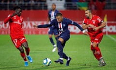 Ligue 1 - Dijon v Paris St Germain<br>Soccer Football - Ligue 1 - Dijon v Paris St Germain - Stade Gaston Gerard, Dijon, France - November 1, 2019 Paris St Germain's Kylian Mbappe in action with Dijon's Mama Balde REUTERS/Jean-Paul Pelissier