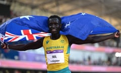 Peter Bol with an Australian flag