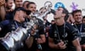 Glenn Ashby (L) and Peter Burling of Team New Zealand celebrate after winning the America’s Cup against Luna Rossa Prada Pirelli Team on Auckland Harbour on Wednesday.