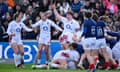 Jess Breach, Natasha Hunt and Hannah Botterman celebrate after Amy Cokayne scores England’s fifth try.