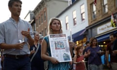 James Wolfe<br>Mourners walk during a vigil in response to a shooting at The Capital Gazette newspaper office, Friday, June 29, 2018, in Annapolis, Md. Prosecutors say 38-year-old Jarrod W. Ramos opened fire Thursday in the Capital Gazette newsroom. (AP Photo/Patrick Semansky)