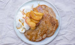 Porridge pancakes served with fruit, yoghurt and honey.