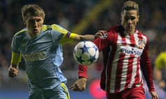 Astana's Kazakh defender Evgeni Postnikov (L) vies for the ball with Atletico Madrid's forward Fernando Torres during the UEFA Champions League group C football match between FC Astana and Club Atletico de Madrid at the Astana Arena stadium in Astana on November 3, 2015. AFP PHOTO / STANISLAV FILIPPOVSTANISLAV FILIPPOV/AFP/Getty Images