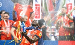 Pelly Ruddock Mpanzu celebrates winning the playoff final.