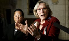 Canada’s Indigenous Affairs Minister Bennett speaks during a news conference with Justice Minister Wilson-Raybould on Parliament Hill in Ottawa<br>Canada’s Indigenous Affairs Minister Carolyn Bennett (R) speaks during a news conference regarding a ruling by the Canadian Human Rights Tribunal with Justice Minister Jody Wilson-Raybould on Parliament Hill in Ottawa, Canada, January 26, 2016. REUTERS/Chris Wattie