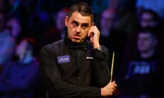 Ronnie O'Sullivan reacts during the quarter-final match against Gary Wilson at the World Grand Prix.
