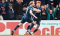 Ross County’s Josh Sims (left) celebrates scoring their third goal against Rangers