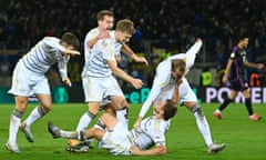 Saarbrücken's players celebrate after the final whistle