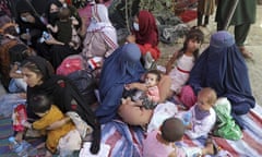 Afghans from northern provinces who fled the Taliban find refuge in a park in Kabul