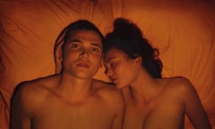 Karl Glusman and Aomi Muyuck in Love