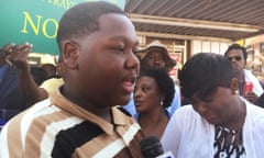 Cameron Sterling speaks as his mother looks on in front of a Louisiana convenience store where his father was killed by police in Baton Rouge<br>Cameron Sterling, 15, speaks as his mother Quinyetta McMillon (R) looks on in front of a Louisiana convenience store where which his father Alton Sterling, 37, was killed by police in Baton Rouge, Louisiana, U.S., July 13, 2016.REUTERS/Letitia Stein