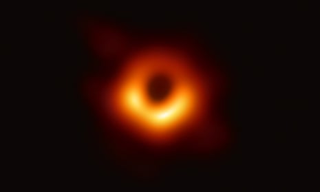 An image captured by the Event Horizon telescope in 2019 of light around  a black hole at the centre of the galaxy M87. 