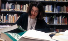 University student studying in the college library.