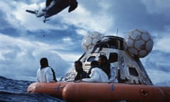 fred haise, jim lovell and jack swigert wait to be picked up by helicopter, 17 april 1970