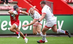 The Toulouse wing Cheslin Kolbe (left) bursts away from Jacob Stockdale of Ulster (centre)
