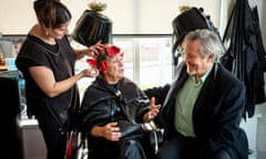 Giles Watling, MP for Clacton, speaks to customer Carol Kincaid in a hair salon