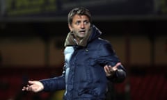 Tim Sherwood, the Swindon Town director of football, was fined and suspended for two matches following comments made to referee Mark Brown.