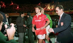 Bryan Robson leads out his team in the second round, second leg fixture. United drew 3–3 at home in the first leg.