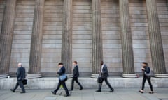 Workers in London’s financial district.