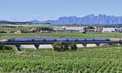 On the right track: the expresss train to Barcelona with the Montserrat massif in the background.