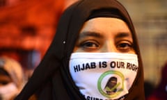 Muslim women protest against Hijab with candle march rally, Kolkata, West Bengal, India - 11 Feb 2022<br>Mandatory Credit: Photo by Rahul Sadhukhan/Pacific Press/REX/Shutterstock (12801274u) A woman take to the street and held a candle light protest against Karnataka hijab ban in educational institutions. Muslim women protest against Hijab with candle march rally, Kolkata, West Bengal, India - 11 Feb 2022