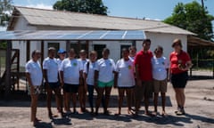 Volunteers outside a solar-powered fruit pulping facility in the Tapajós-Arapiuns Extractive Reserve in Para, Brazil