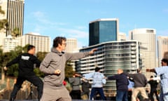 Lou Reed Attends Tai Chi Session At Vivid LIVE<br>SYDNEY, AUSTRALIA - JUNE 07: American musician Lou Reed attends a Tai Chi session led by his personal teacher Master Ren Guan Yi at the Sydney Opera House forecourt on June 7, 2010 in Sydney, Australia. Members of the public were invited to take part in the free event as part of the Lou Reed-curated Vivid LIVE festival. (Photo by Mark Metcalfe/Getty Images)