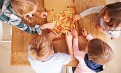 VARIOUS<br>Mandatory Credit: Photo by Monkey Business Images/REX/Shutterstock (5088889a) MODEL RELEASED Children sharing a pizza together, overhead view VARIOUS