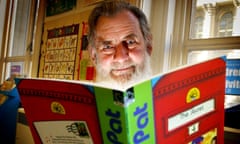 John Cunliffe reading a Postman Pat story to children at a library in Leeds in 2003.