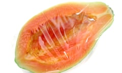 papaya without seeds wrapped in plastic folie sheet Frischhaltefolie cling film plastic wrap preserve serve fresh freshness<br>AAAA06 papaya without seeds wrapped in plastic folie sheet Frischhaltefolie cling film plastic wrap preserve serve fresh freshness    lr1